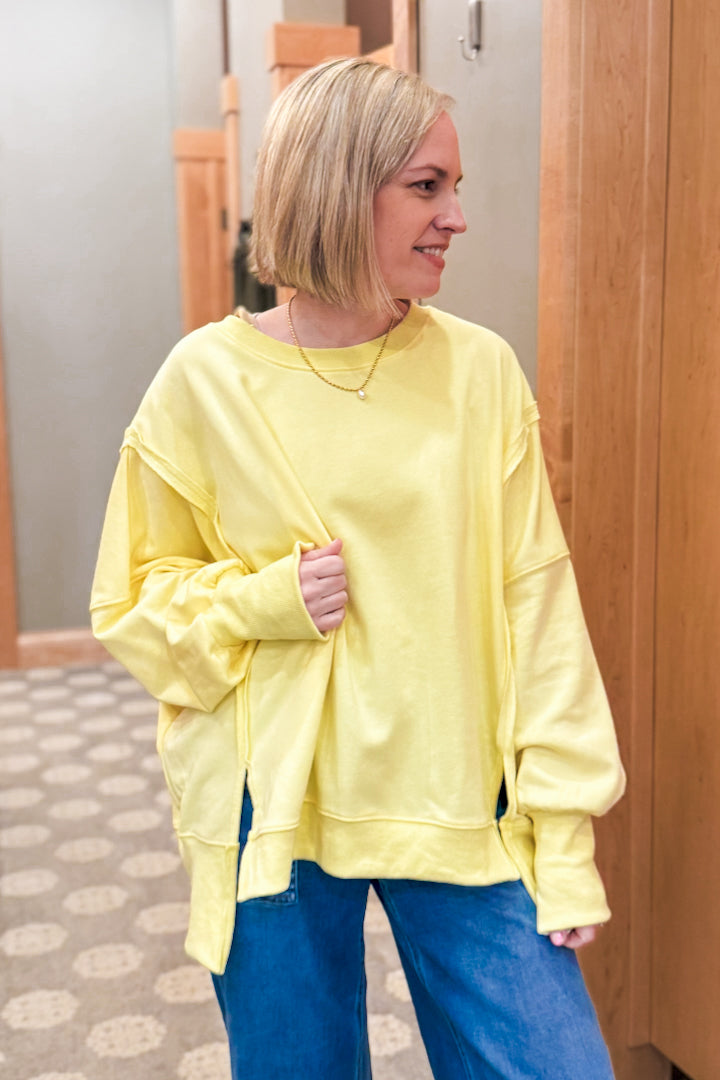 Oversized hi-low hem sweatshirt with exposed seam details yellow