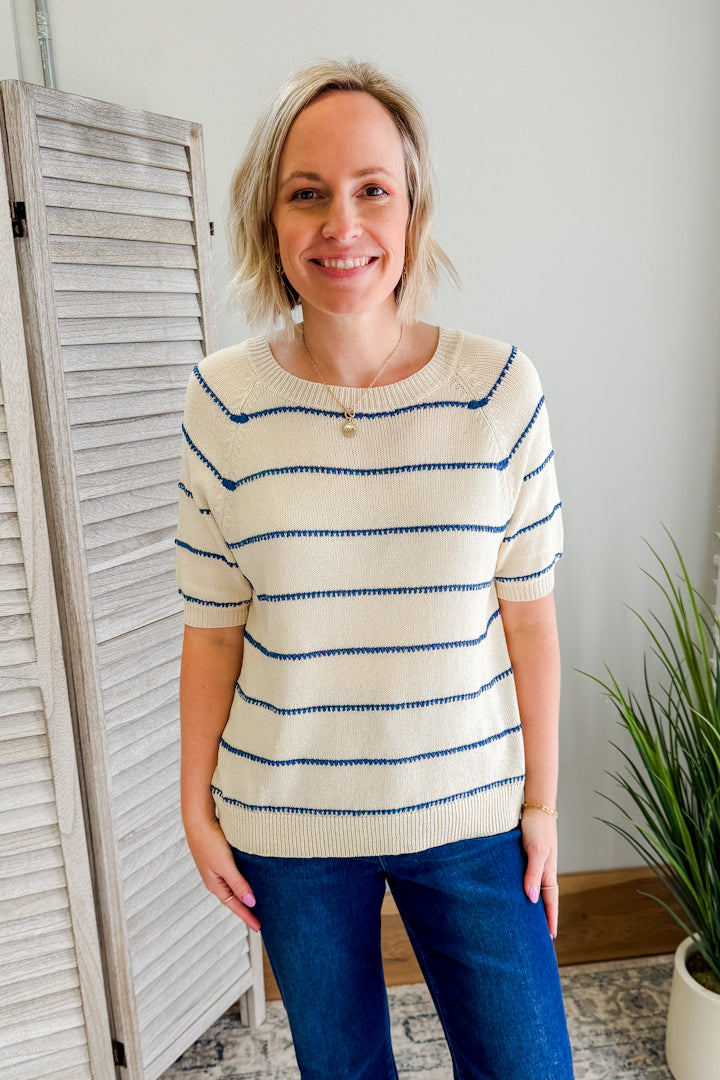 Women's striped short sleeve knit sweater.