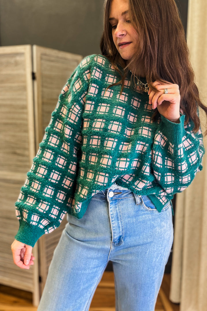 Oversized fuzzy checkered sweater.
