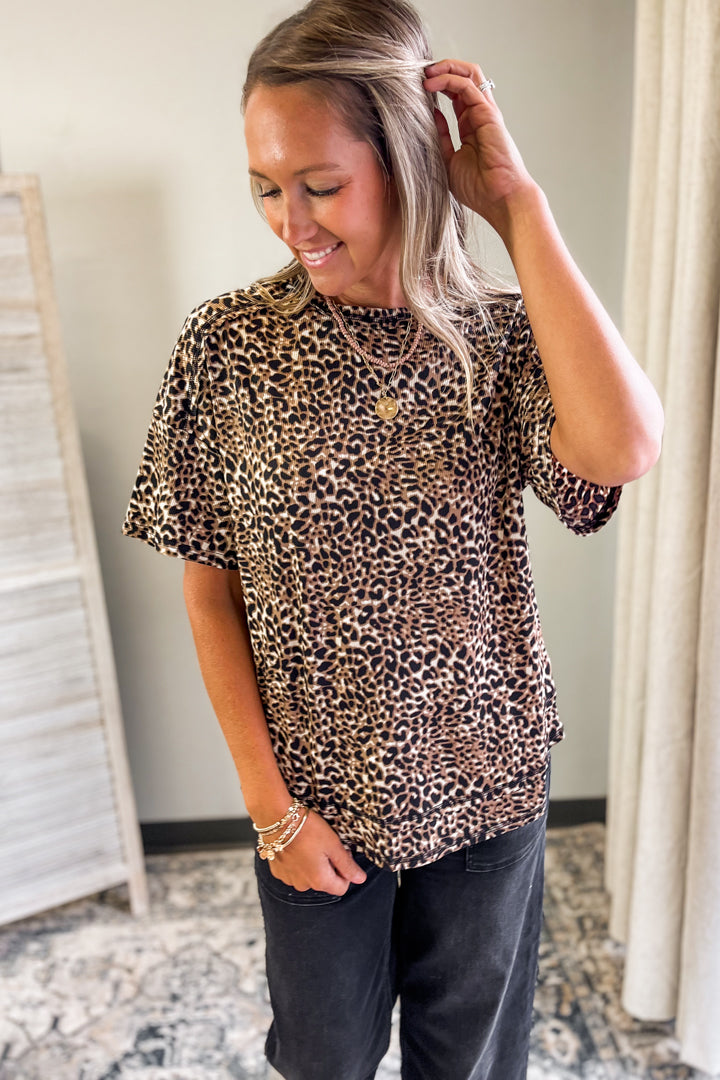 An animal print mocha color top for women
