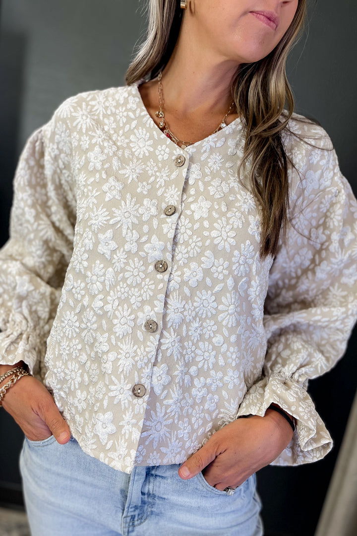 A boho style floral textured top for women