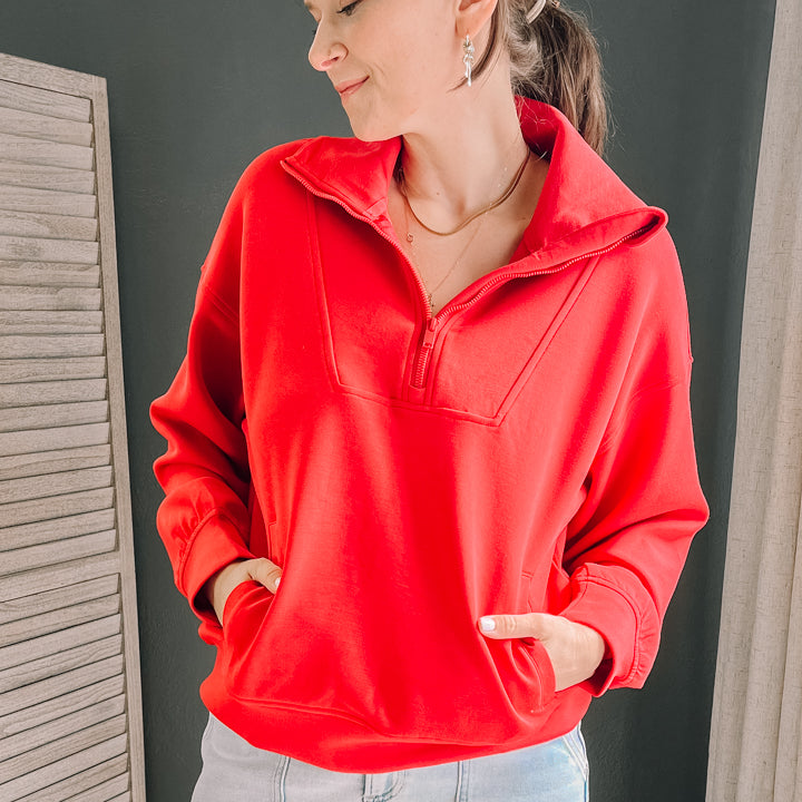 Quarter zip pullover with funnel neck made from scuba knit material