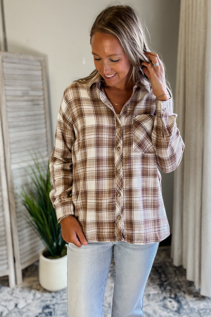 Women's brown plaid flannel shirt