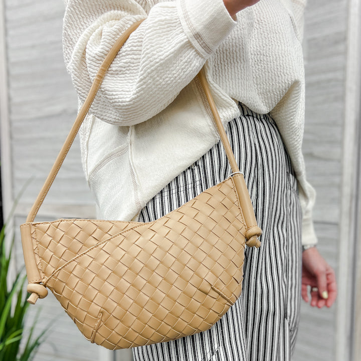 A small shoulder bag with knotted strap detail beige