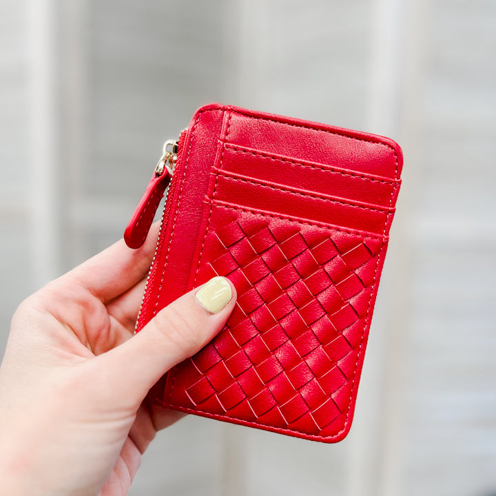 A small slim woven wallet red