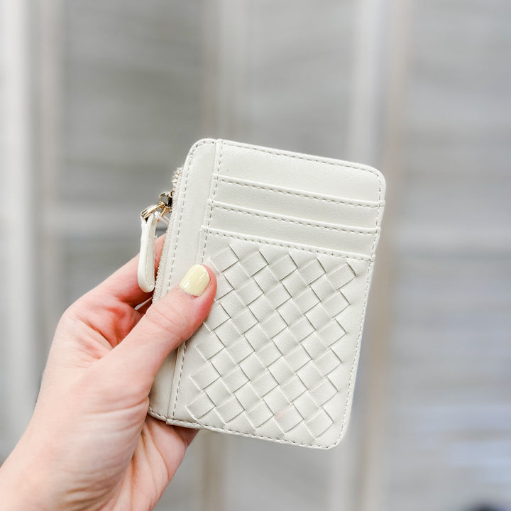A small slim woven wallet white