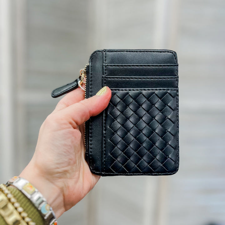 A small slim woven wallet black