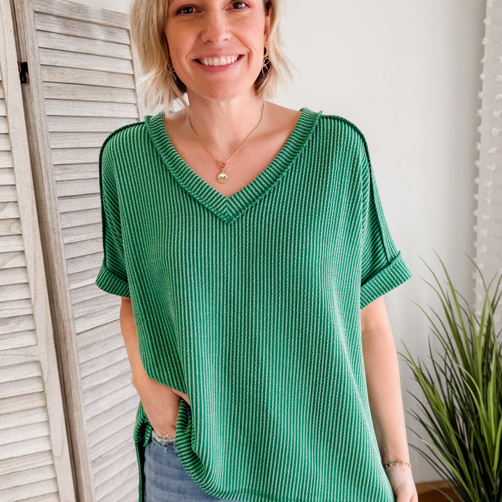 Women's flowy ribbed V-neck top with high-low hemline green
