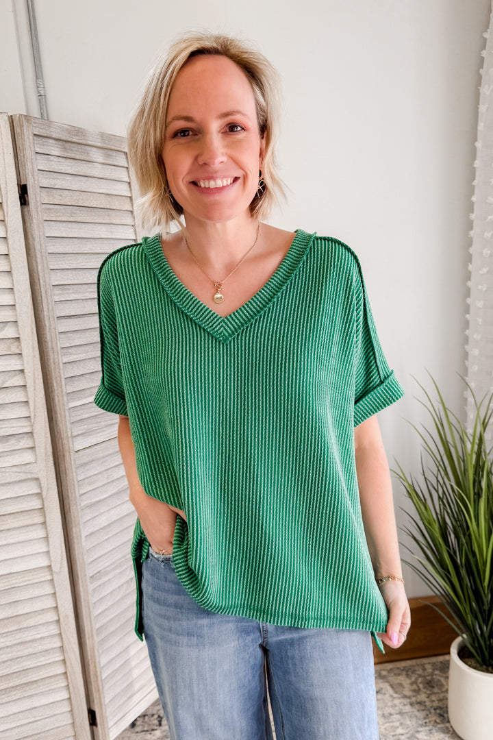 Women's flowy ribbed V-neck top with high-low hemline green