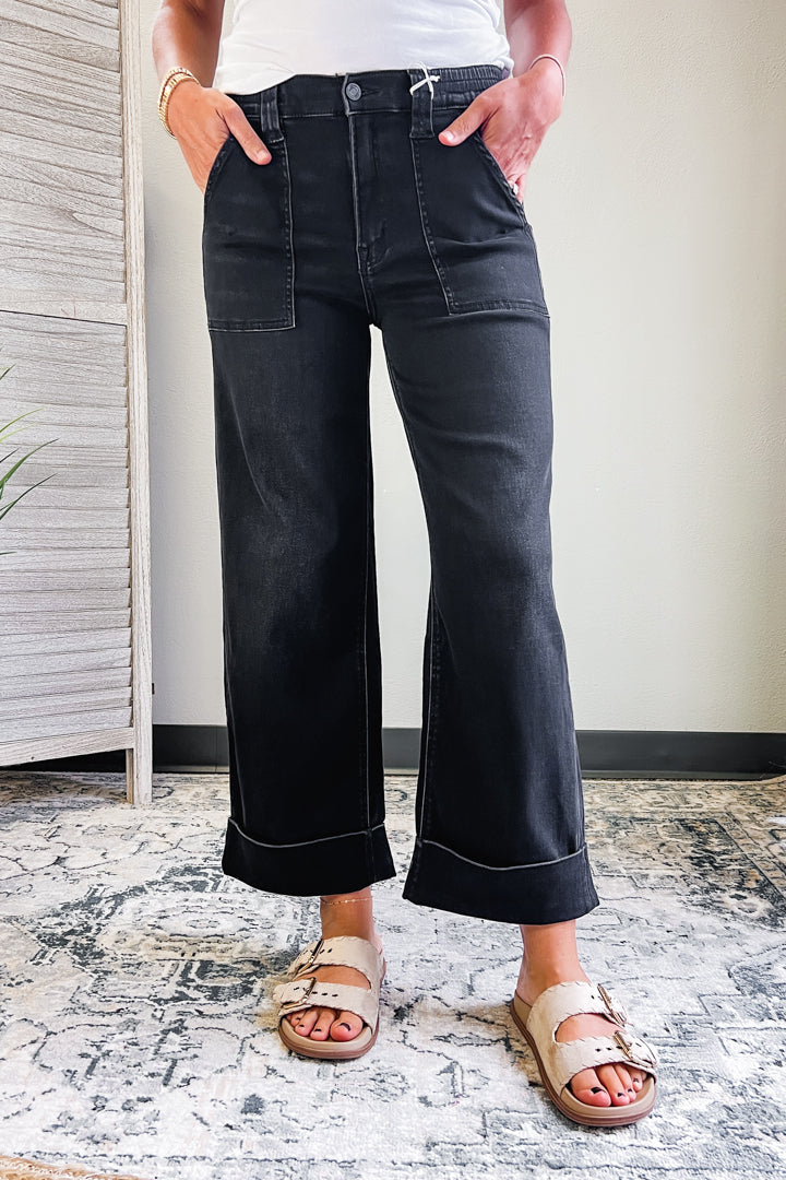 A high rise elastic waist denim pant for women black