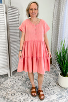 Women's gauze dress with button front and tiered skirt coral pink