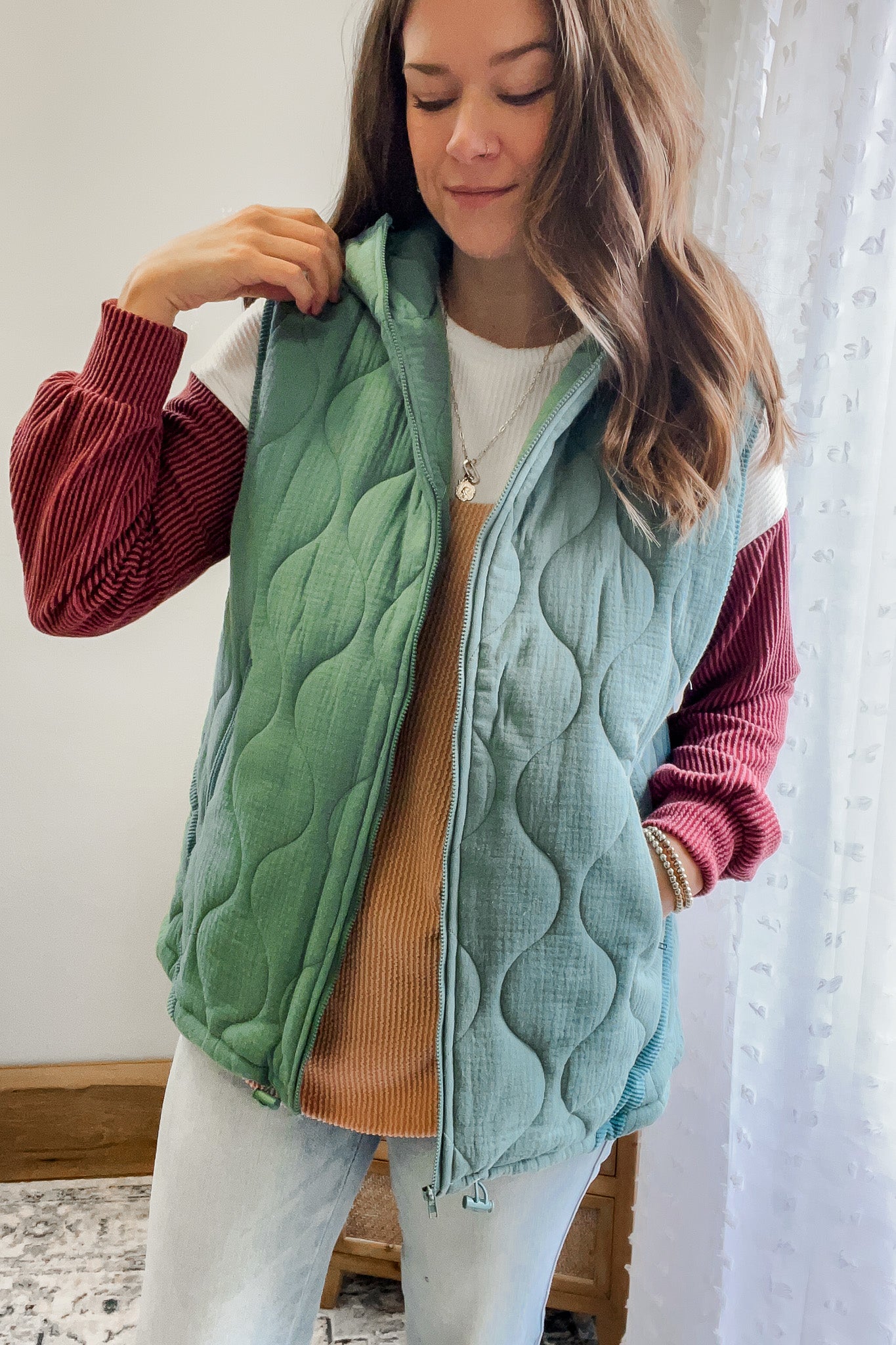 womens quilted hooded vest teal green