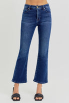 Women's high rise cropped bootcut denim with raw hem detail.