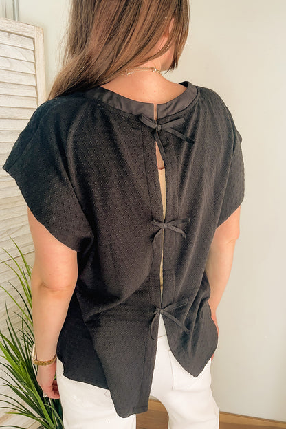 Women's open back sweater with bow tie details black
