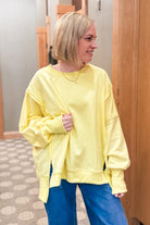 Oversized hi-low hem sweatshirt with exposed seam details yellow