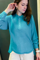 Oversized henley top with flattering hi-low hem aqua blue