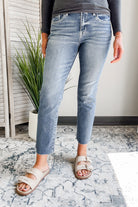 Women's medium wash mid-rise straight crop jeans