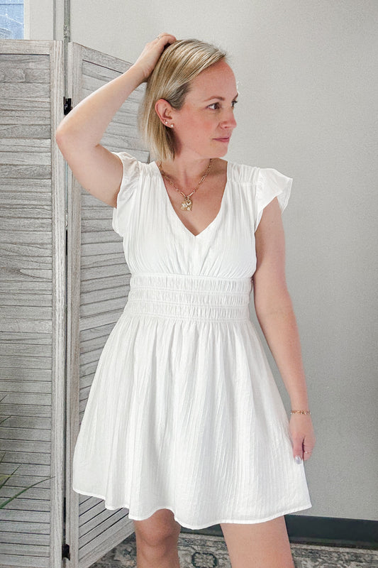 Women's mini dress with V-neckline and smocked waist detail white ivory bridal summer