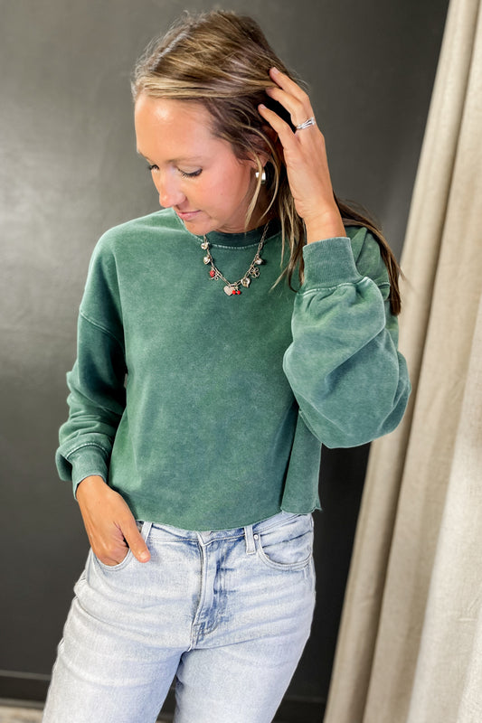 Women's cropped crewneck sweatshirt with raw hem details dark green