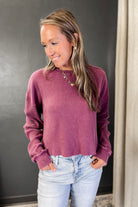 A waffle knit long sleeve top burgundy plum