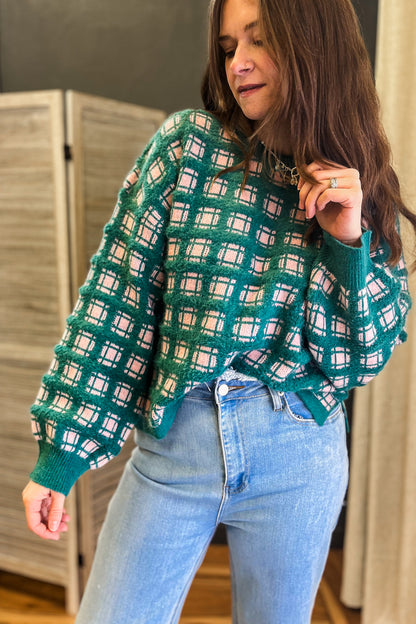 Oversized fuzzy checkered sweater.