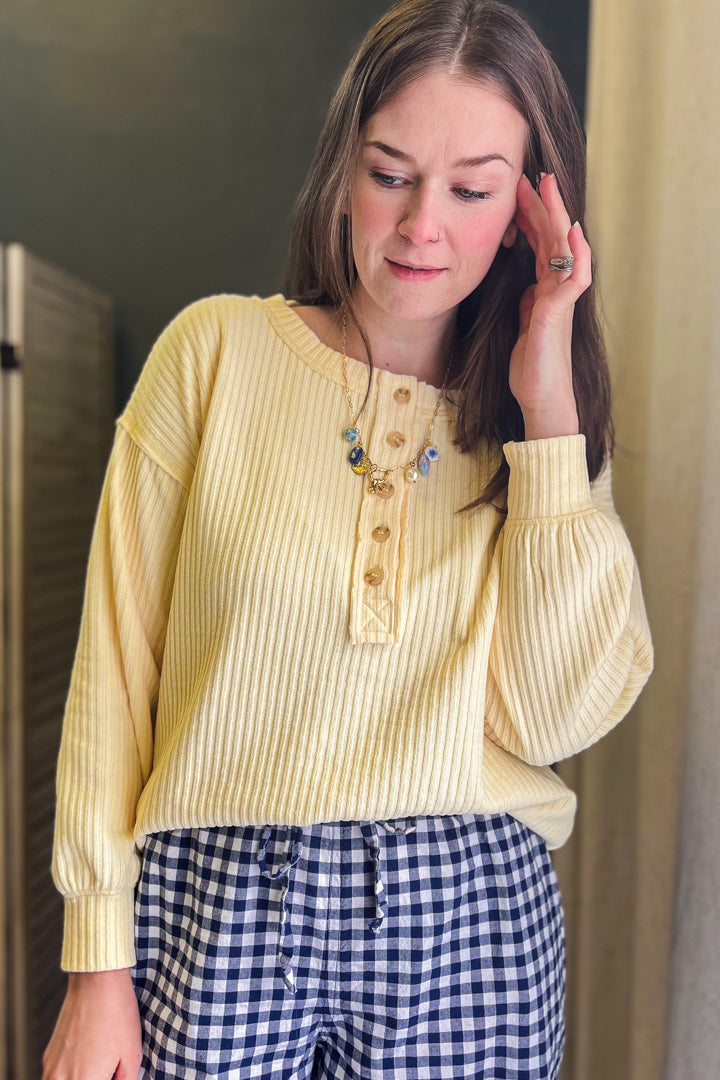 Long sleeve ribbed henley with exposed seam details