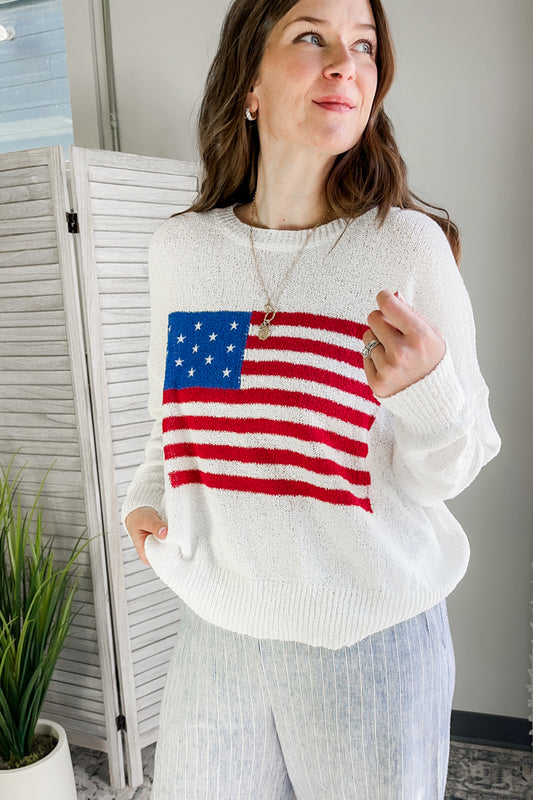 Women's knit sweater with American flag graphic