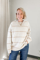 An oversized stripe beige sweater for women