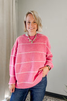 An oversized stripe pink sweater for women