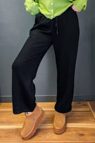 ide leg pants with drawstring waist made from scuba material black