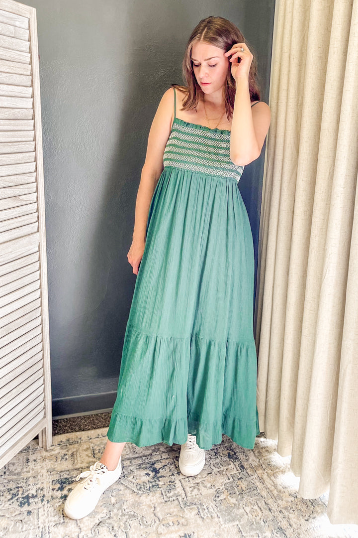 Embroidered maxi dress with smocked detail.