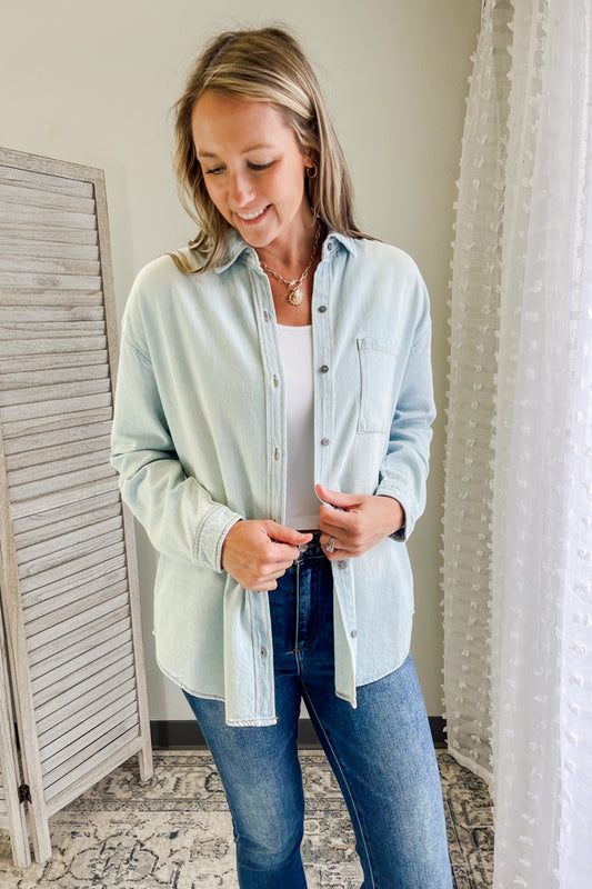 Women's oversized button up denim shirt light wash risen jean