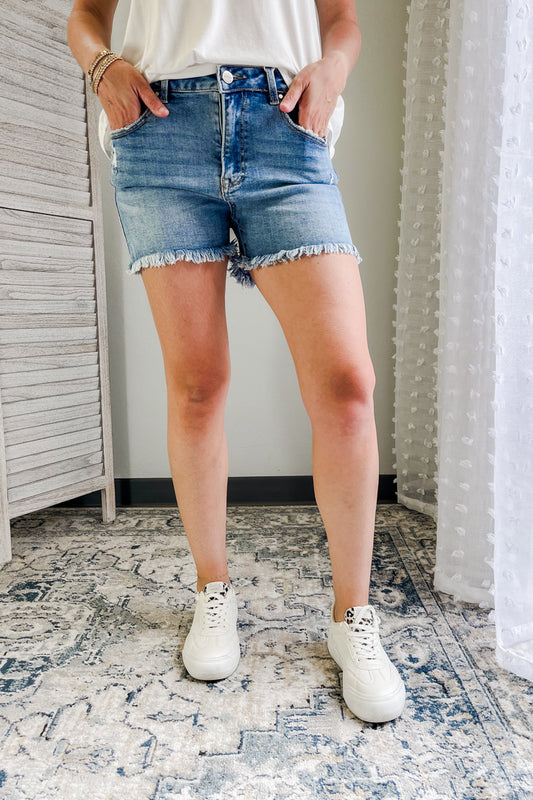 Women's high rise frayed denim shorts