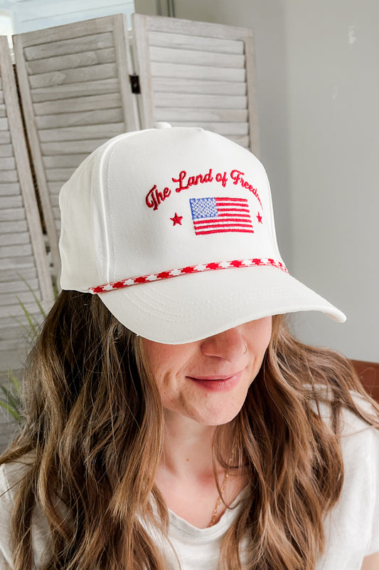 Women's trucker hat with "Land of Freedom" embroidery american
