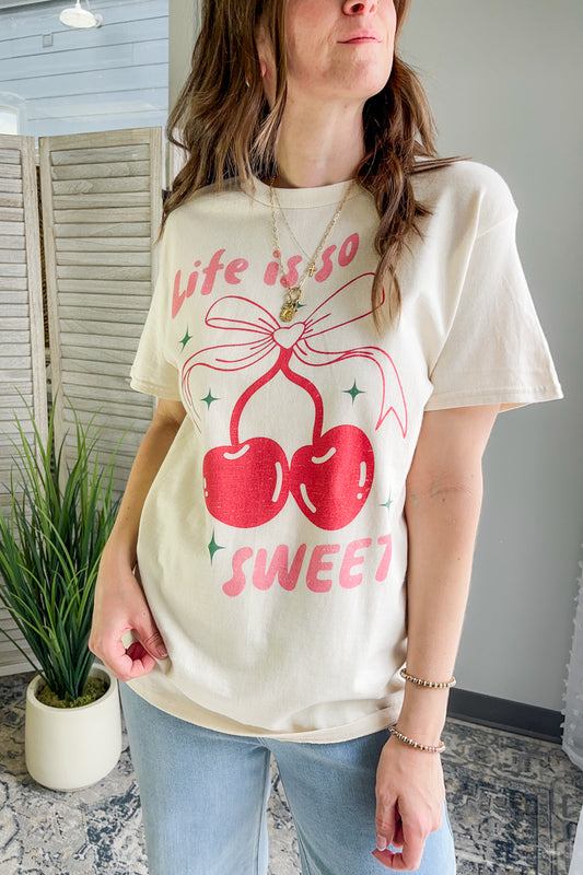 Women's relaxed-fitting tee with "life is so sweet" graphic cherry