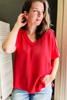 Women's flowy ribbed V-neck top with high-low hemline red