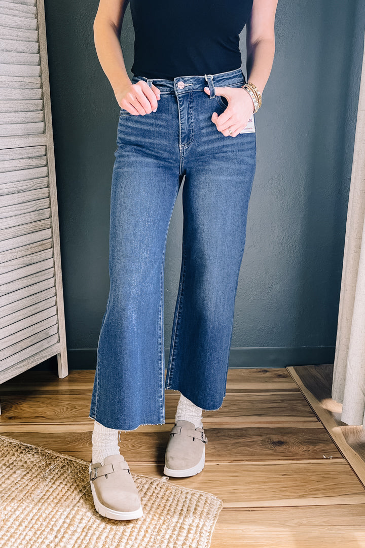 High rise wide leg denim with raw hem and tummy control