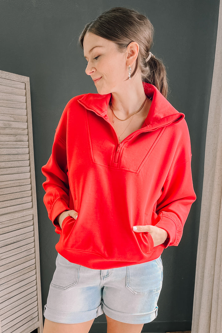 Quarter zip pullover with funnel neck made from scuba knit material