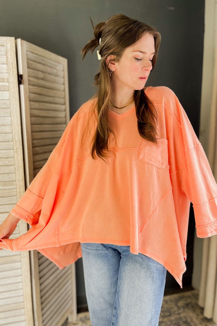 An oversized light weight boho top for women coral