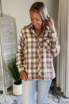 Women's brown plaid flannel shirt