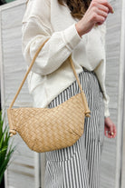 A small shoulder bag with knotted strap detail beige