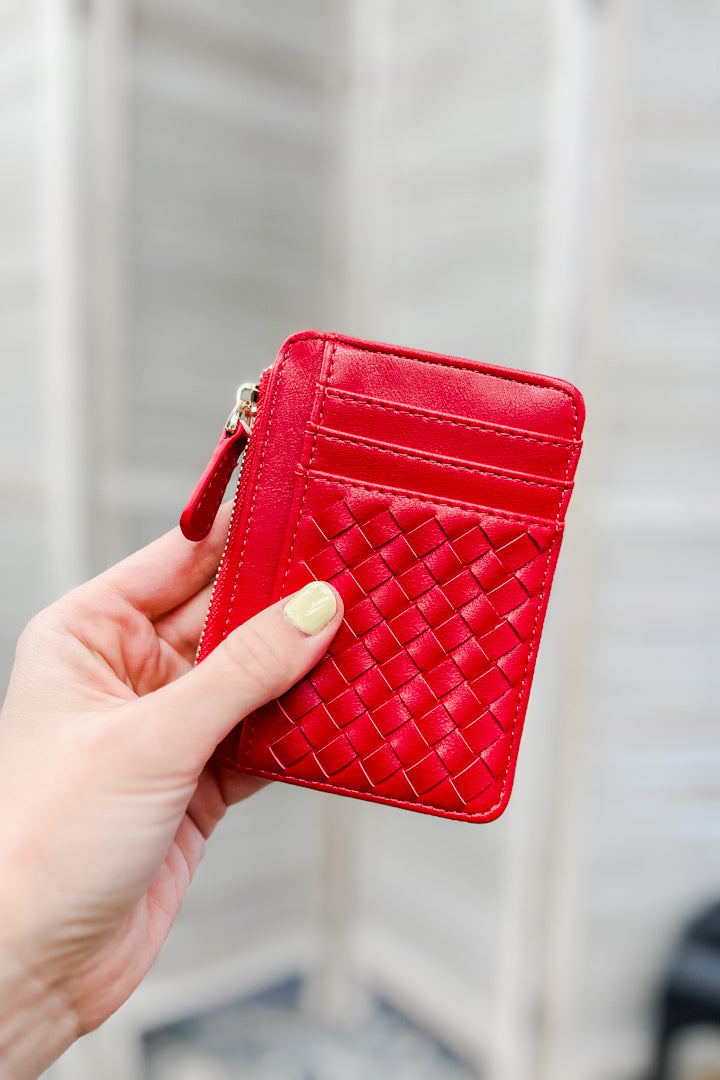 A small slim woven wallet red