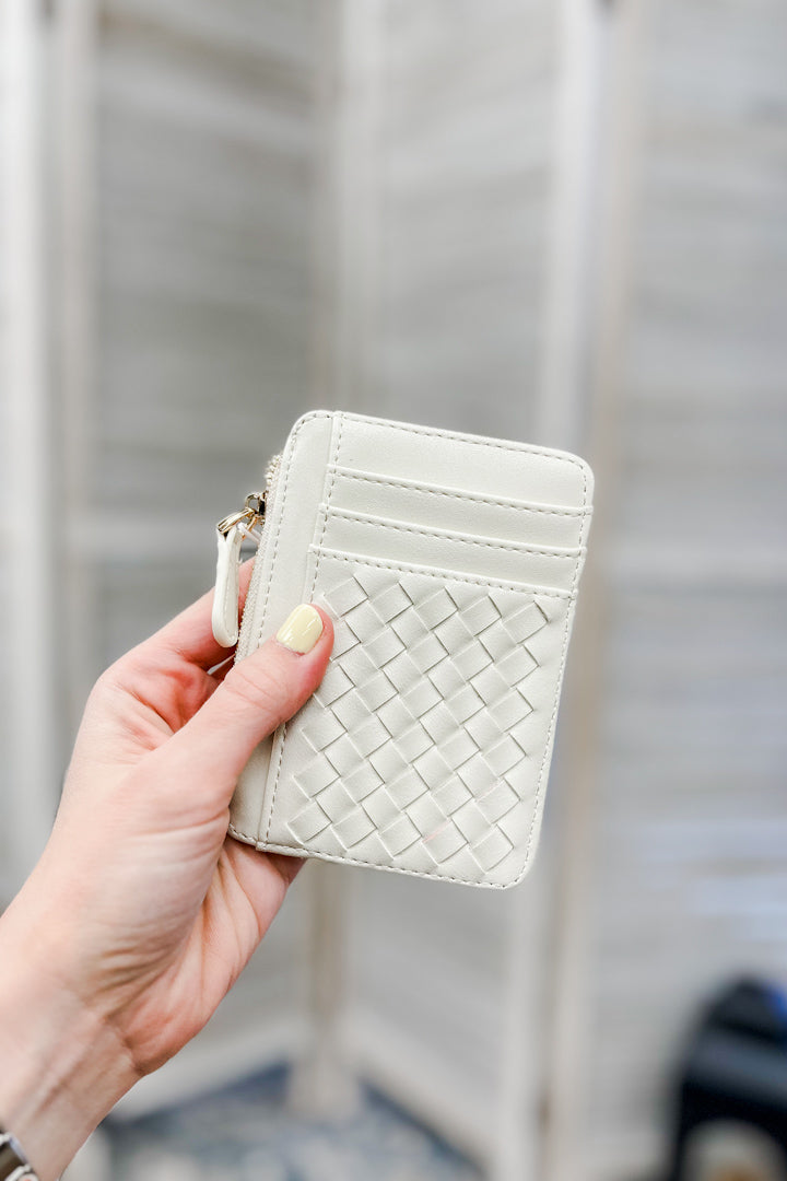A small slim woven wallet white