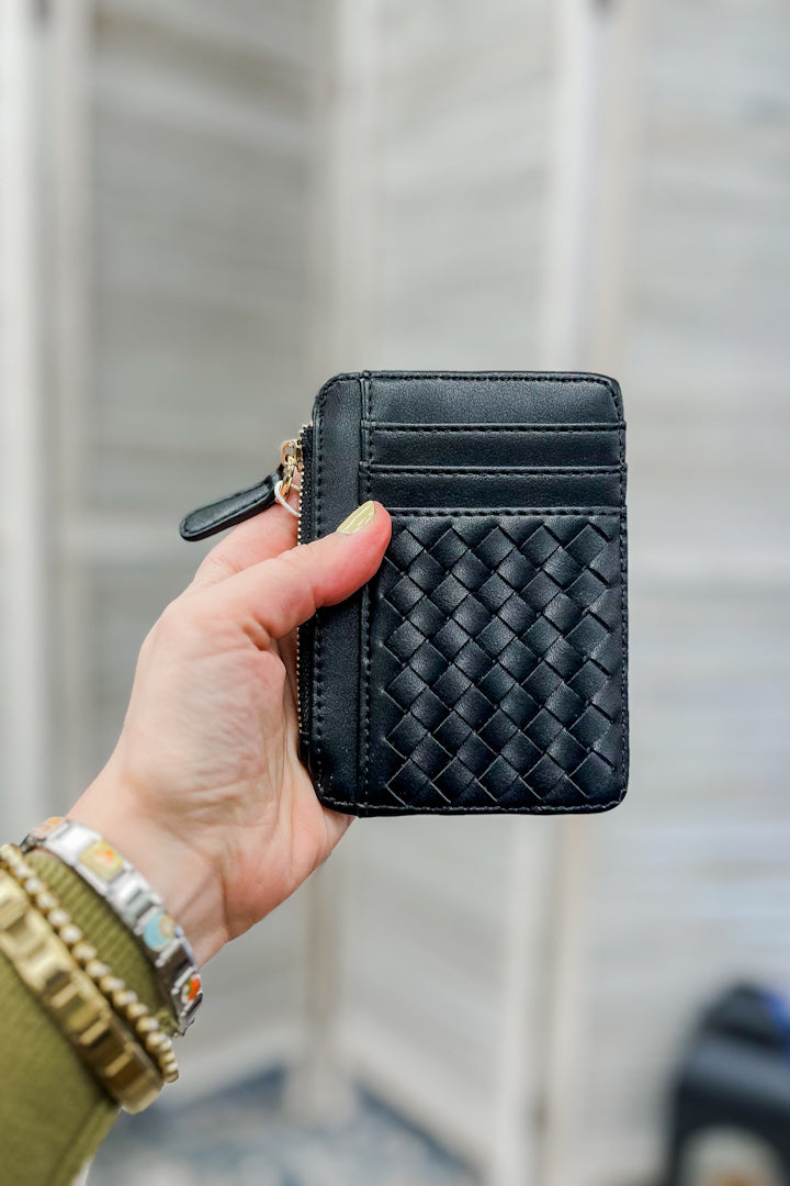 A small slim woven wallet black