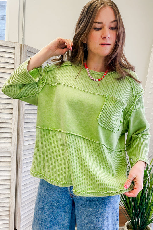 Women's mixed material long sleeve top with raw hem details lime green