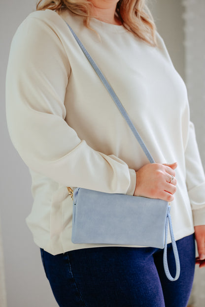 light blue spring cross body wristlet purse
