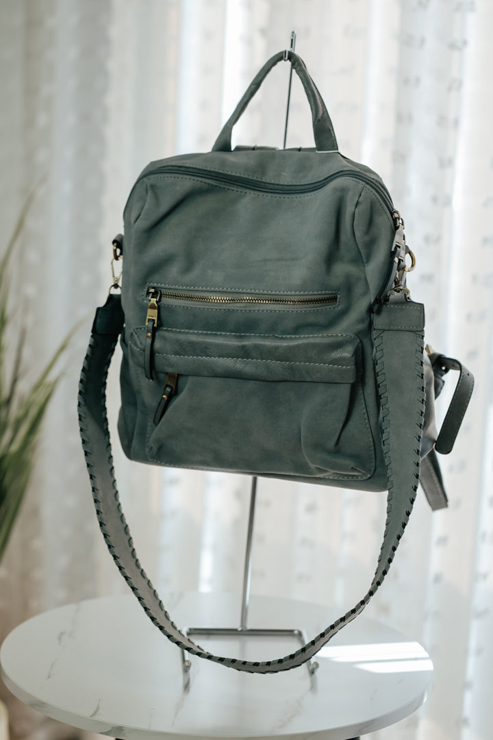 suede whipstitch strap backpack